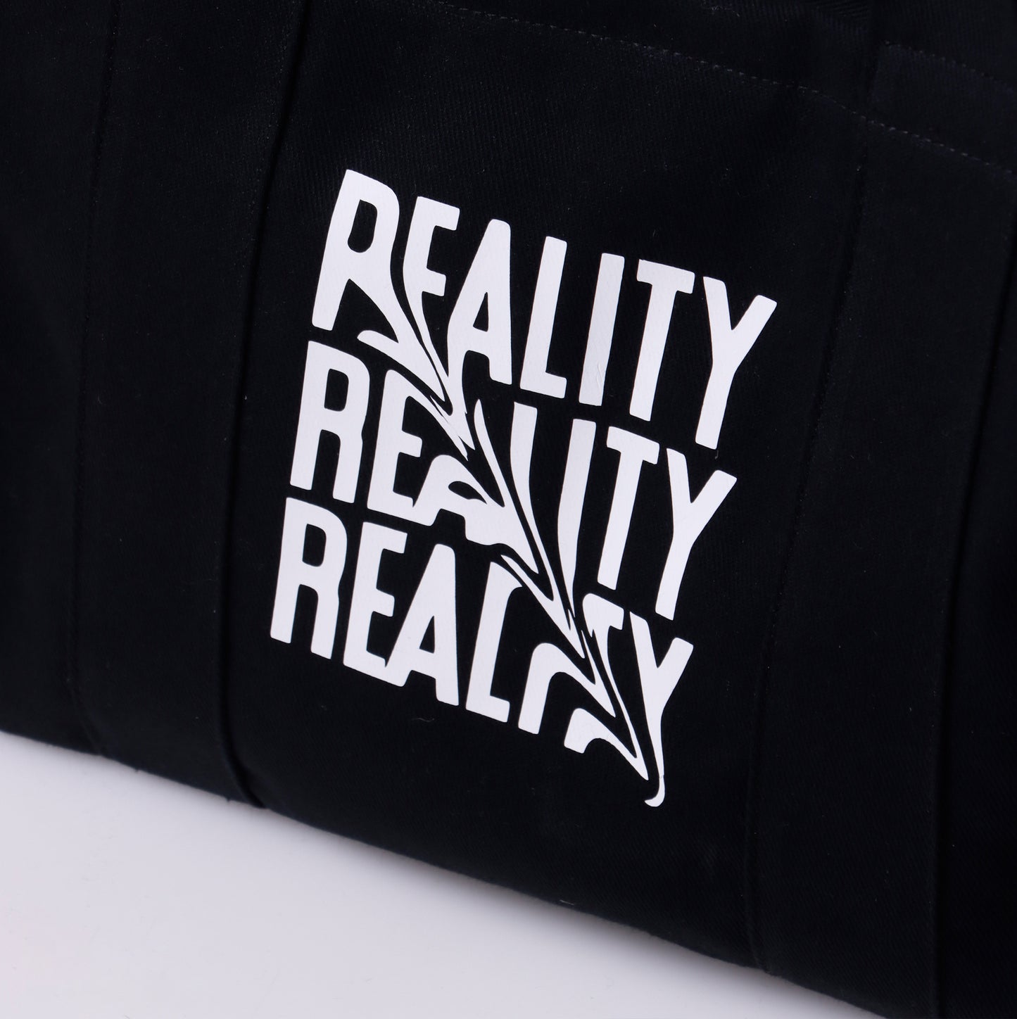 The R E A L I T Y Bag