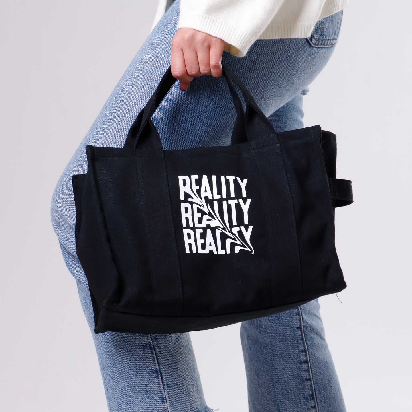 The R E A L I T Y Bag